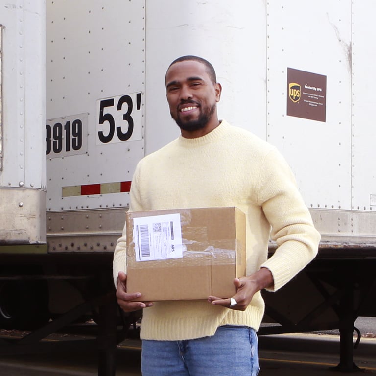 Gus, part of our returns processing team, stands ready to help at the cargo bay.